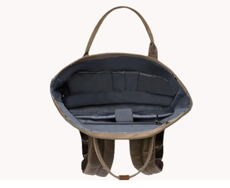 Black casual polyester backpack showing cover opening and internal laptop sleeve.