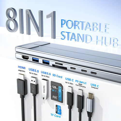 Aluminium folding laptop docking station stand with multi-port hub and HDMI output on a desk