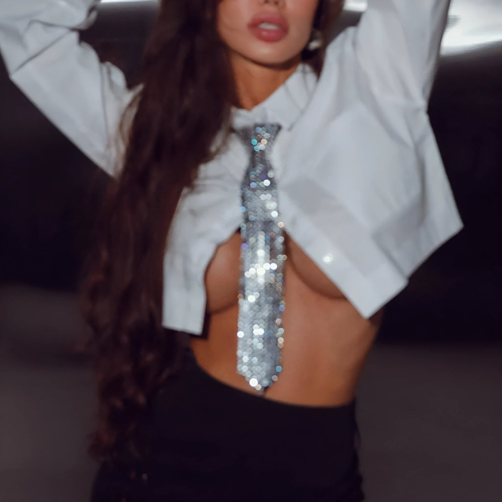 Metallic sequined bow tie in silver colour with arrow design for parties and music festivals