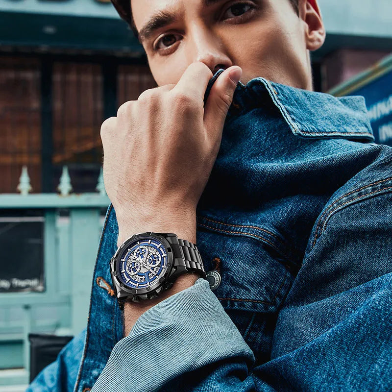 Men's waterproof quartz watch with luminous markers on a steel bracelet, showing black case with blue dial option.