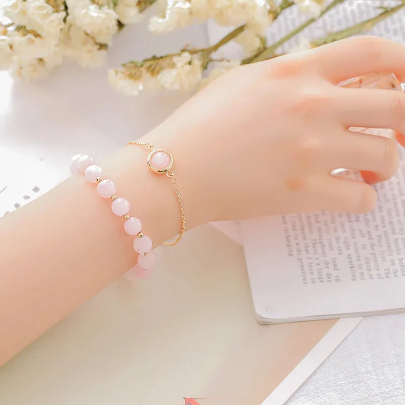 Double-layer women's bracelet with crystal beads and lucky charms in gold electroplated finish