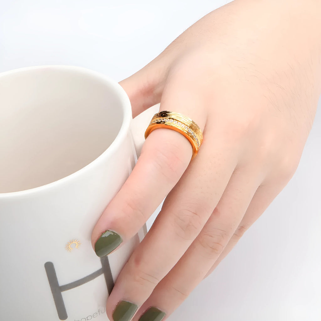 Gold geometric zircon ring on copper base in women's sizes 6, 7, and 8