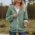 Green women's hooded zip-up sweater coat with a front zipper, shown in a loose, casual fit.