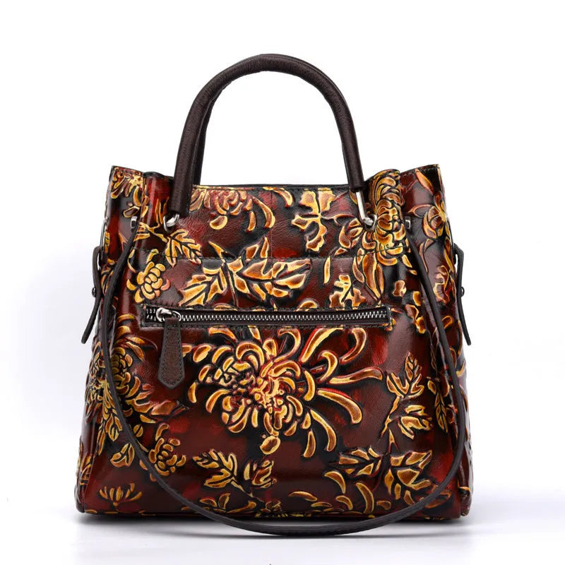 Trendy women's three-dimensional embossed first layer cowhide messenger bag with floral pattern in brown