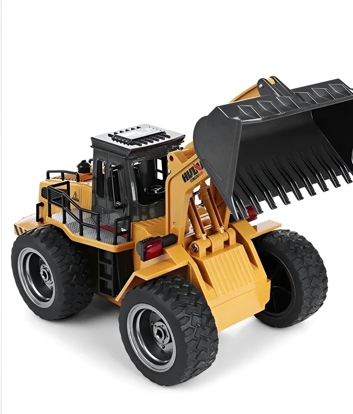 Remote control construction vehicle with lights and music on a floor, electric powered, plastic metal rubber build