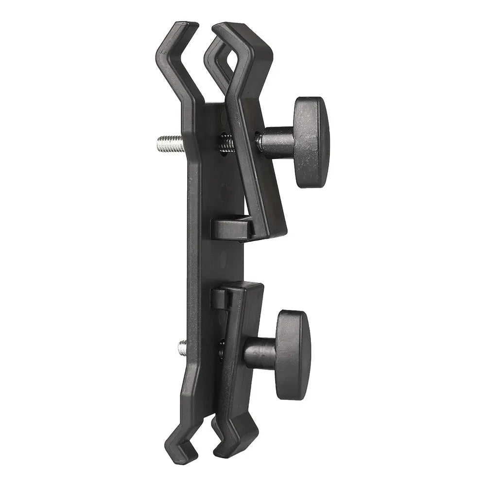 Black plastic umbrella clip attached to camera tripod holding smartphone under umbrella