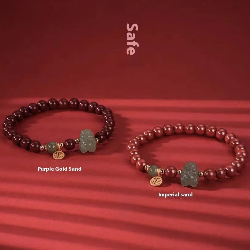 Hand-carved Hetian jade bracelet with animal zodiac designs in 8mm bead size