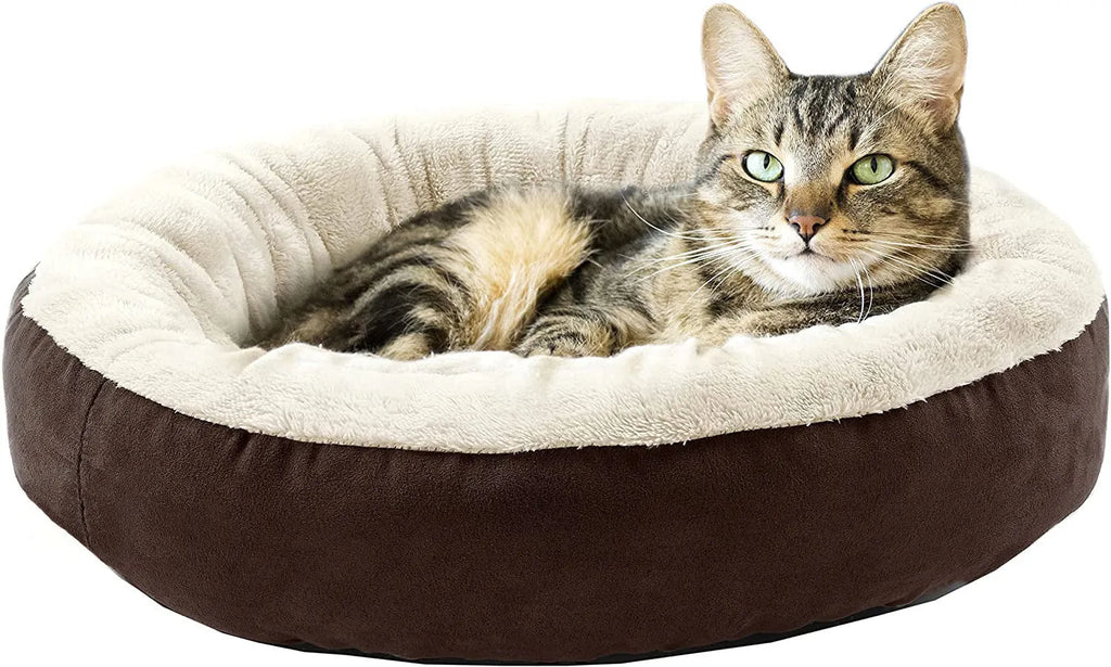 Circular grey cloth pet bed with raised sides for a cat or small dog