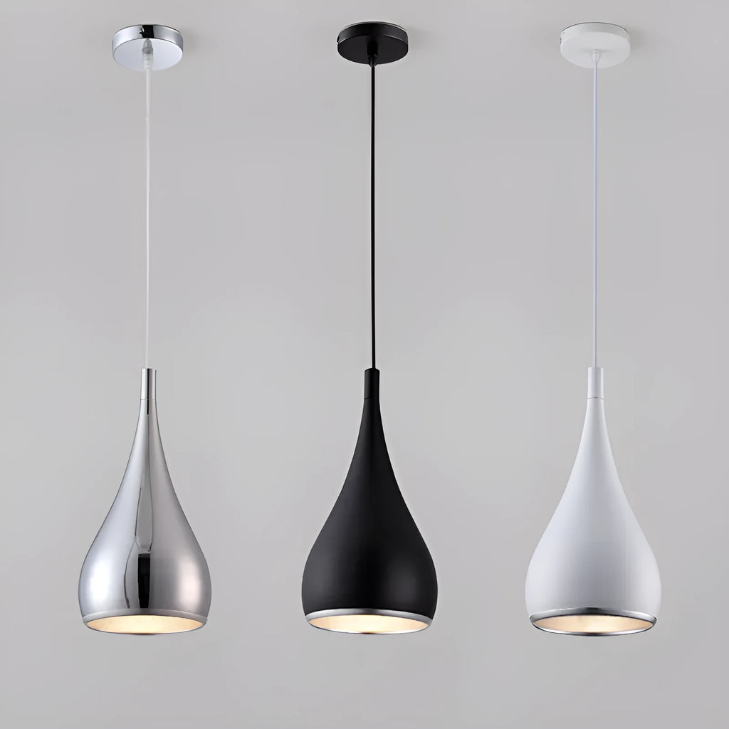 Minimalist iron pendant chandelier with three adjustable heads in a black finish, hung from a ceiling.