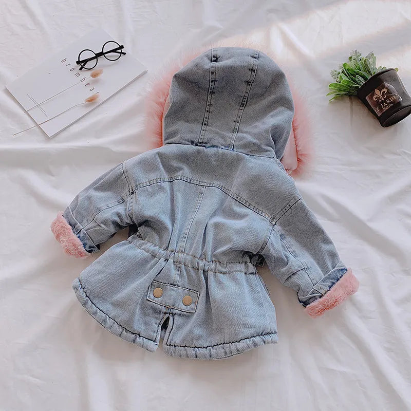 Blue denim jacket for girls with a fleece lining and attached hood.