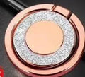Bling glitter metal phone holder ring in silver colour, showing 360-degree rotation feature on a mobile phone