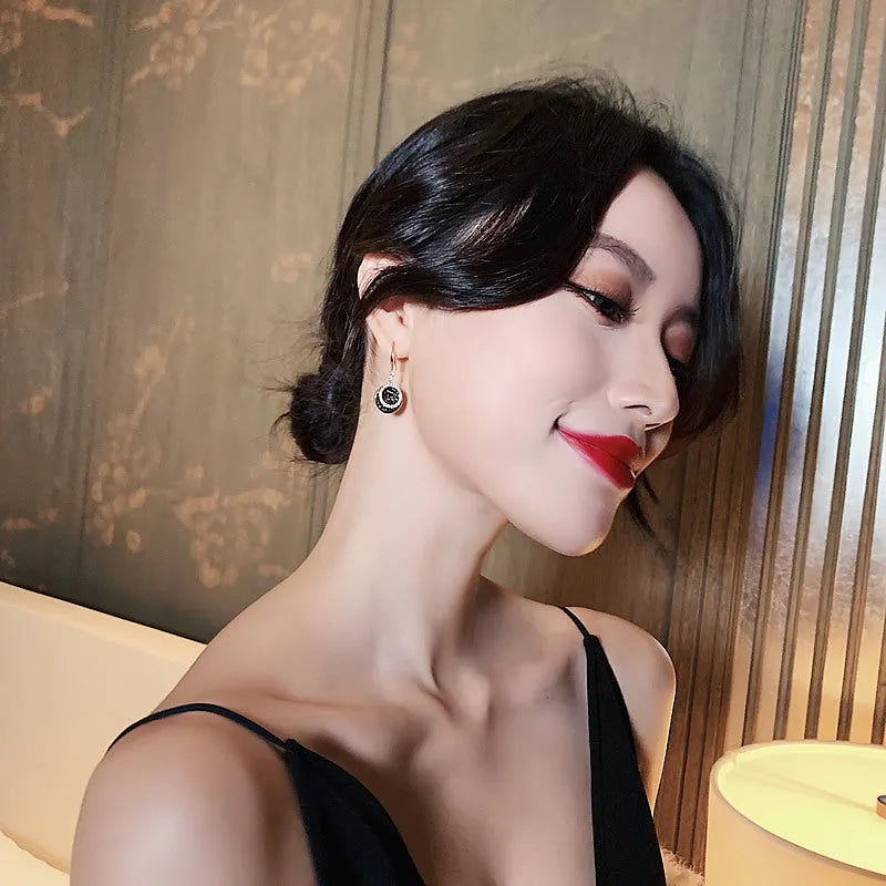 Black geometric round alloy earrings with 3.6cm length and retro Hong Kong style design