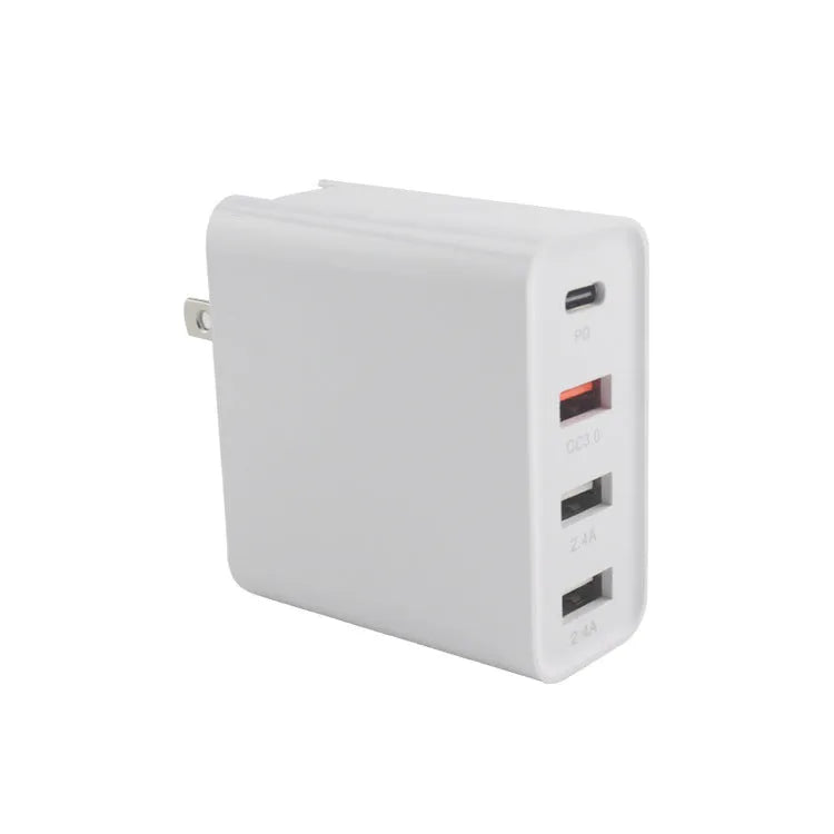 Black four-port USB-C wall charger with UK, US, EU, and AU plug adaptors on a white background.