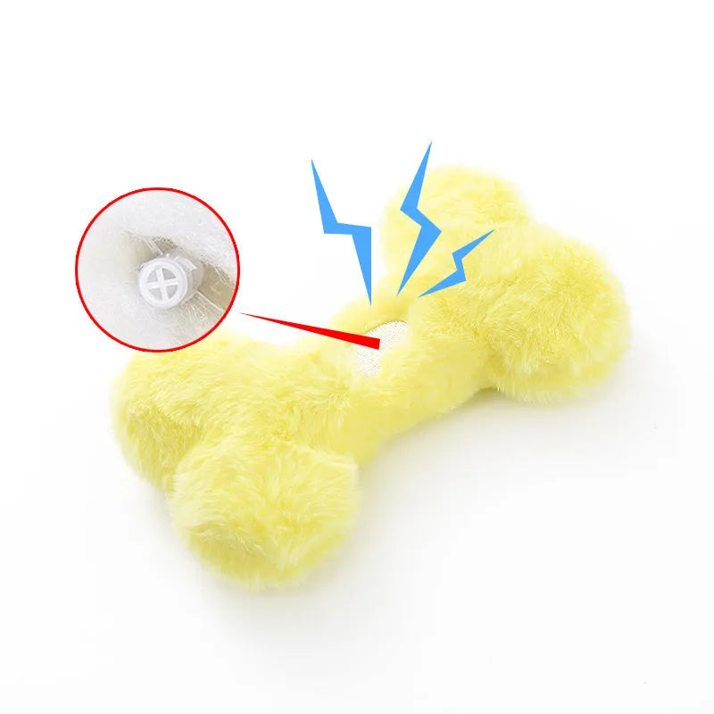Blue heart-shaped love bone plush dog toy with a squeaker for interactive pet play.