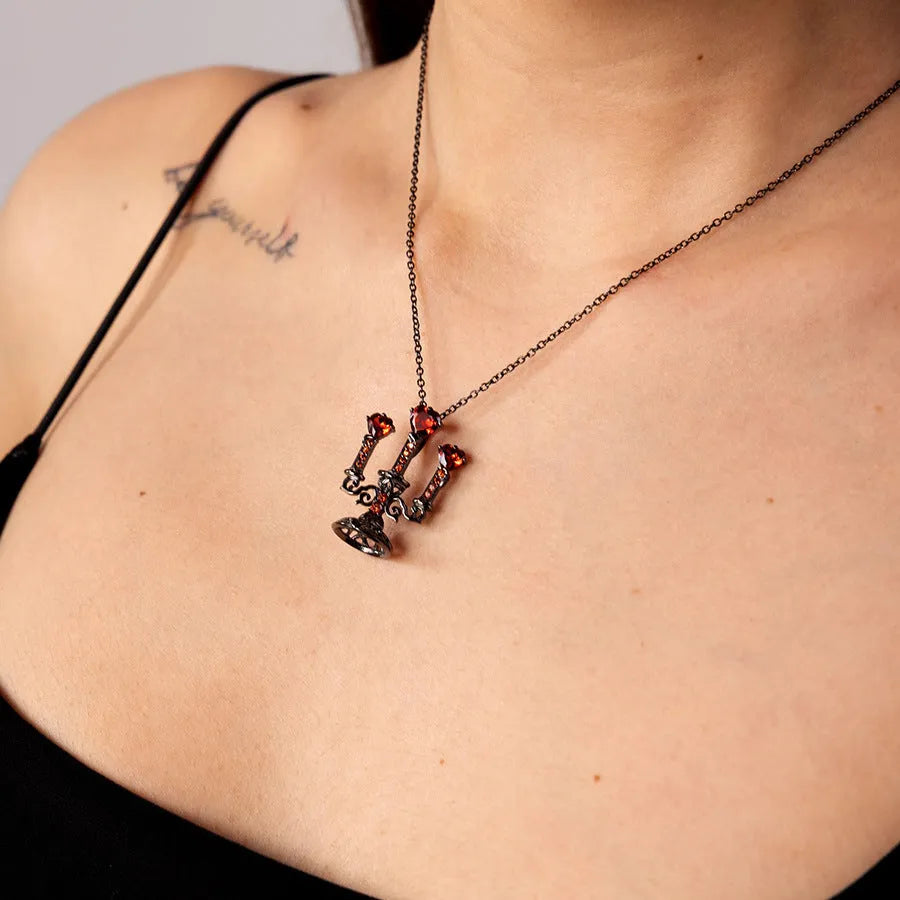 Gothic women's clavicle chain necklace with hollow retro candlestick zinc alloy pendant on a cross chain.