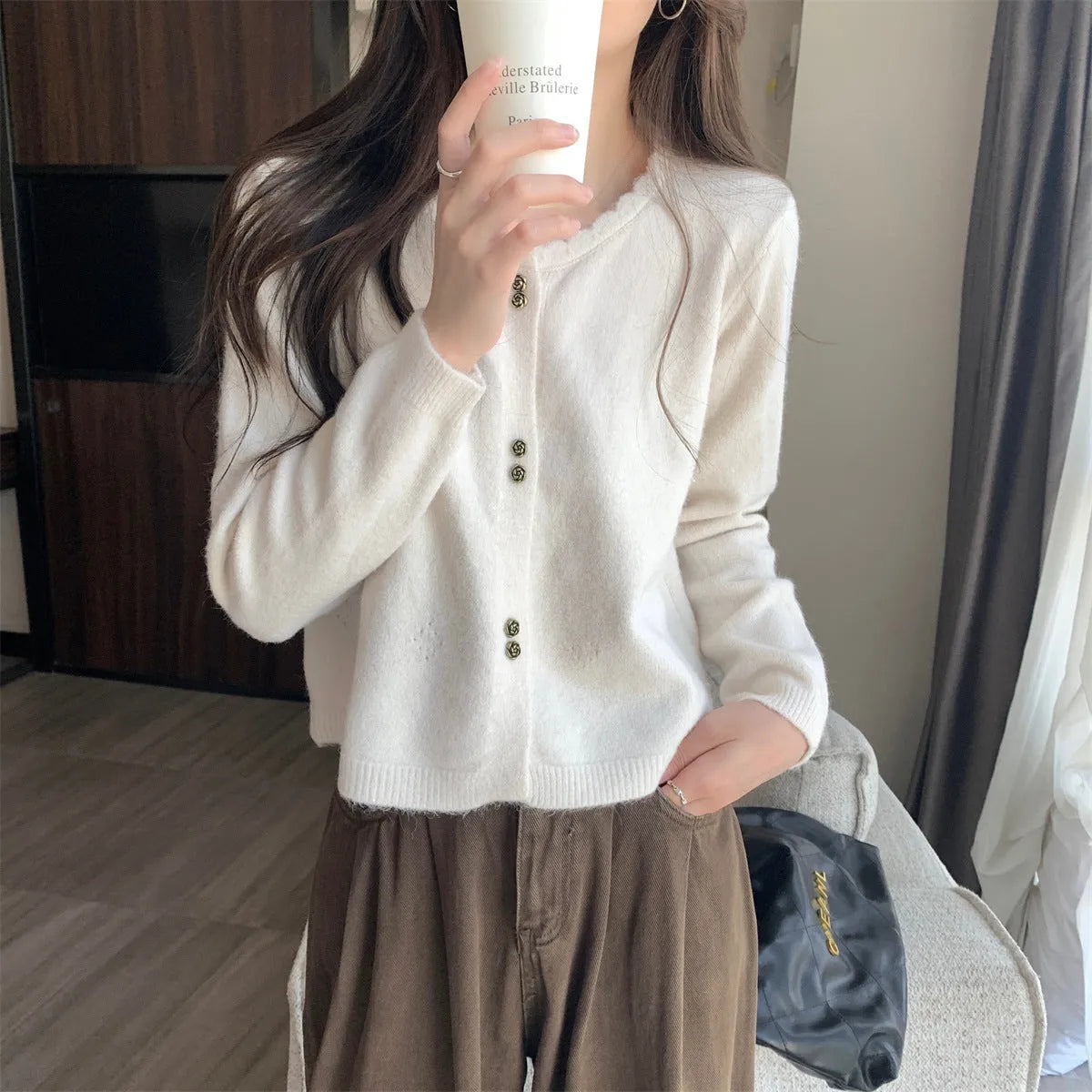 Women's long-sleeved acrylic cardigan coat in free size regular cut