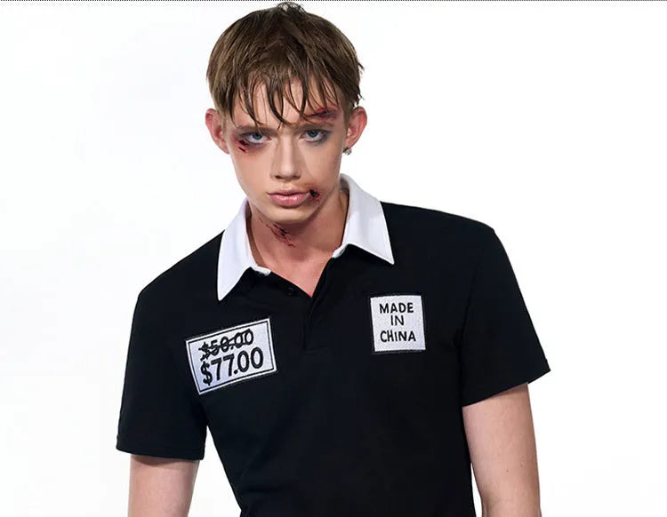 Black slim fit men's polo shirt with embroidery hat design and short sleeves