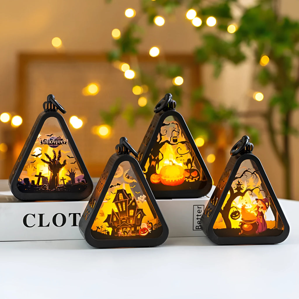 Small plastic Halloween pumpkin lamp and themed decoration props in four colour variants.