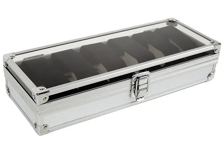 Brushed aluminium watch box holding six watches with a front jewellery storage bin.