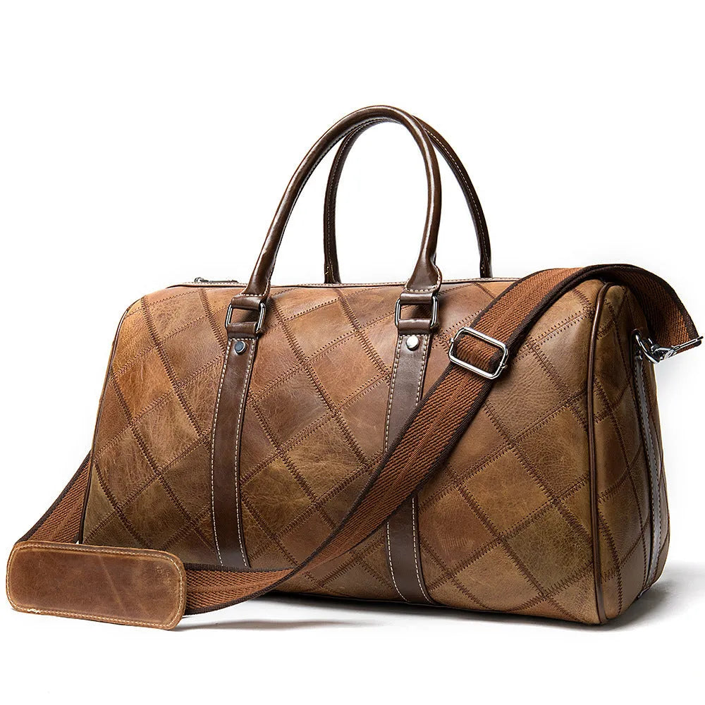 A vintage-style men's leather duffel bag in black with a single strap and internal organiser compartments.