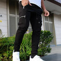 Men's zipper multi-pocket loose casual trousers in black with adjustable belt and small leg opening