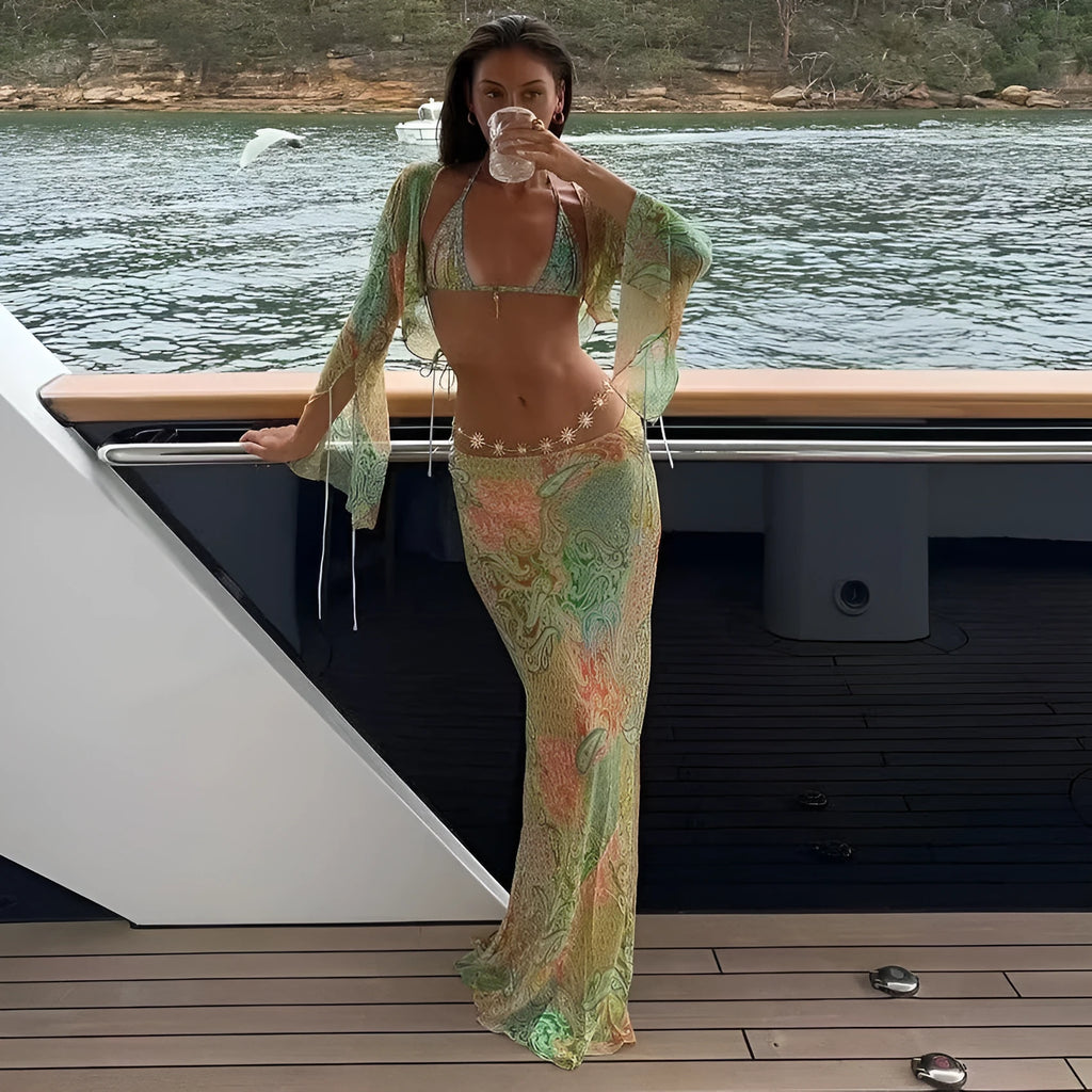 Halterneck printed lace-up split swimsuit with long bell sleeves in green, front view