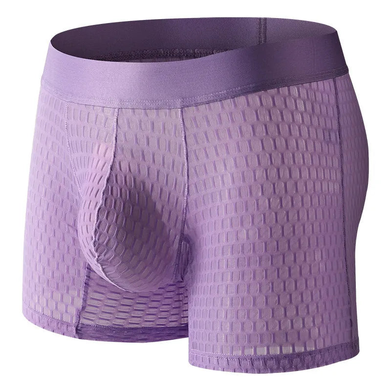 Men's low waist lace mesh boxers in black, showing geometric pattern and breathable fabric texture.