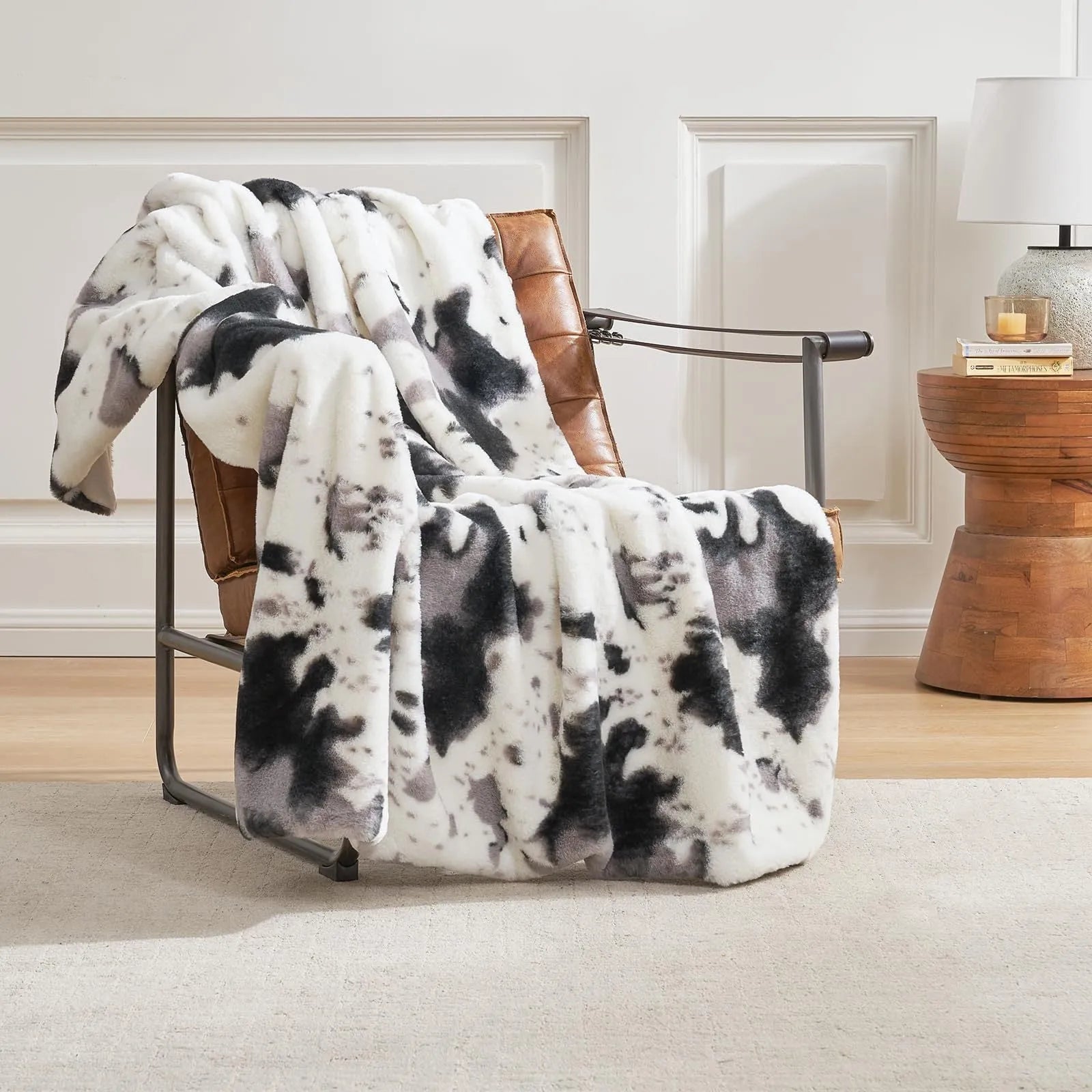 White flannel blanket with animal stripe pattern on a sofa