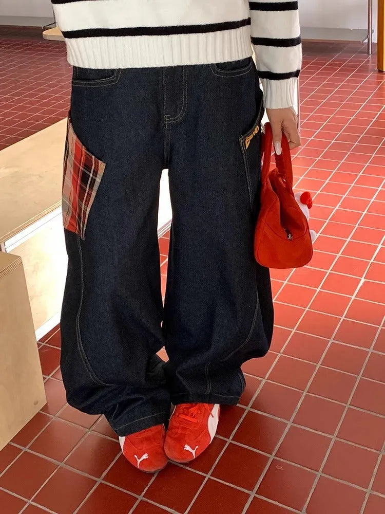 Cotton loose straight-leg trousers in plaid pattern showing mid waist and casual styling