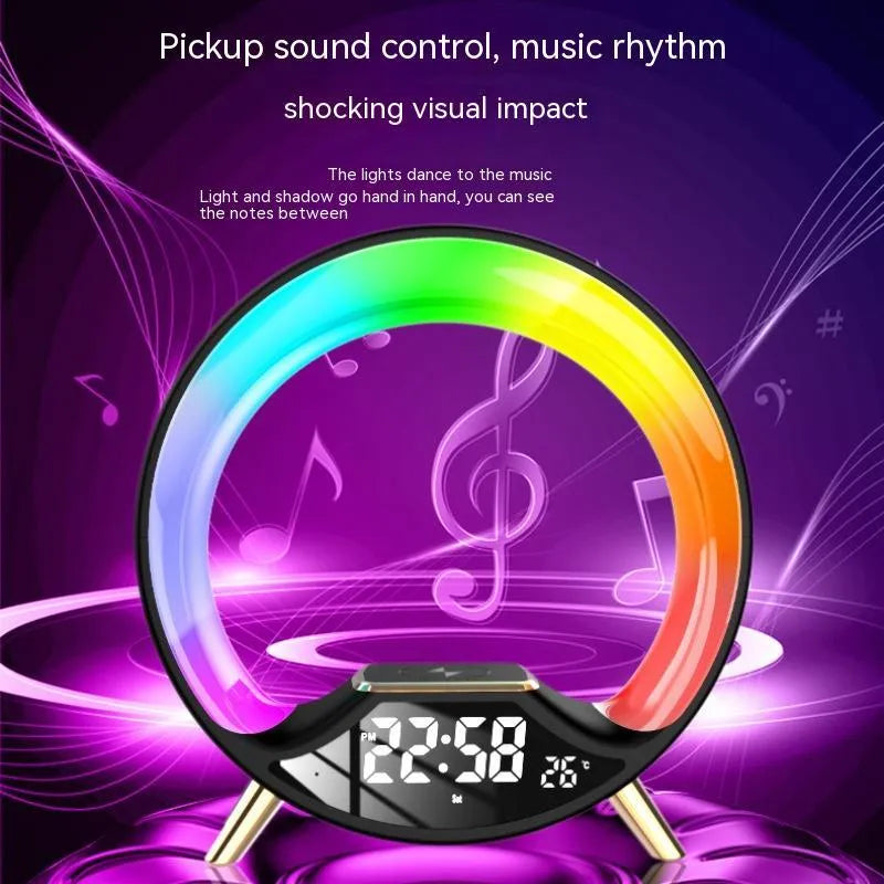 LED Colourful Music Atmosphere Clock in black, a wireless charging night light with Bluetooth speaker and digital display.