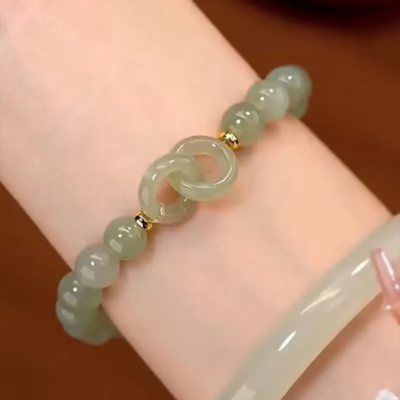 Chinese style glass bracelet with bamboo joint design elements in multiple colour options