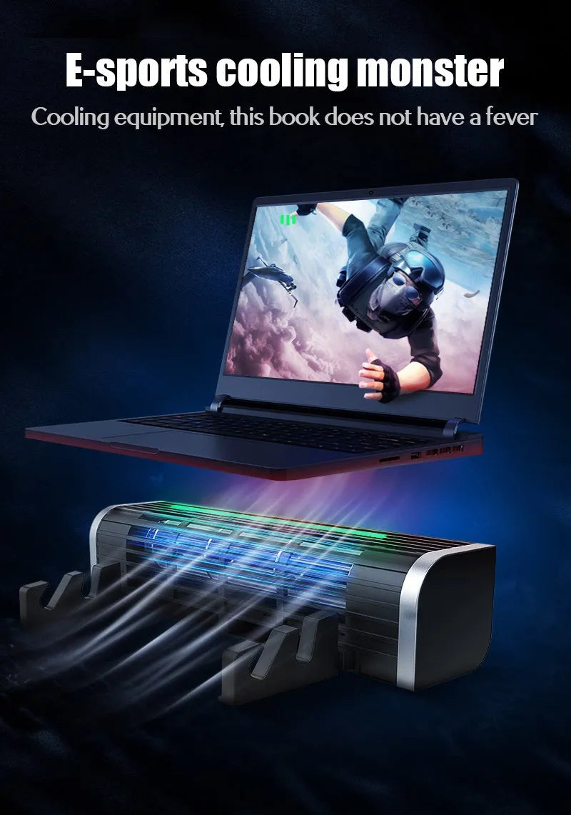 Black notebook cooler with two fans, a USB cable, placed under a silver laptop on a desk.