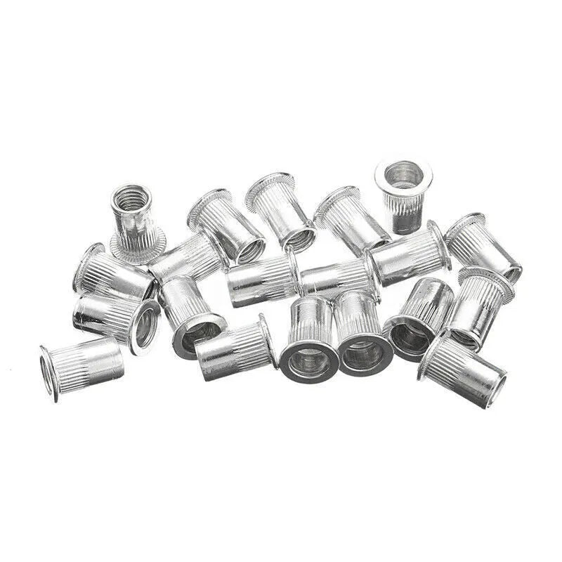 Alloy steel manual riveter tool with assorted nosepieces from a nut gun set.