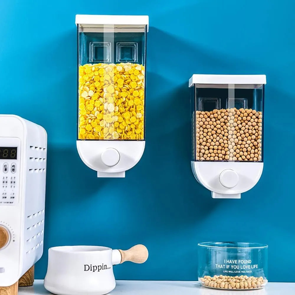 Clear plastic wall-mounted kitchen food storage container with easy-press lid for cereals and dry goods.
