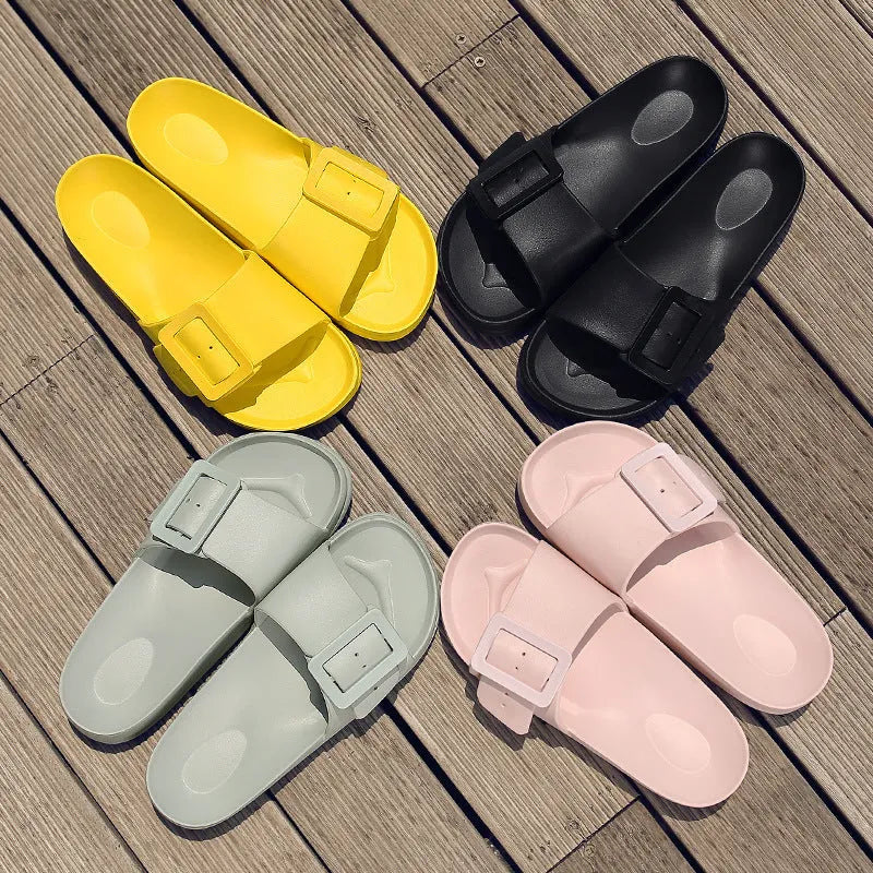 Women's grey blue buckle slipper flip-flops with a soft EVA sole on a plain background.