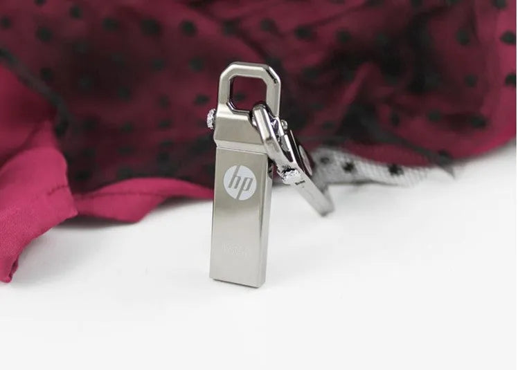 Metal USB flash drive with custom corporate logo, 48.6mm length, on a white background