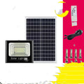 Black solar-powered LED flood light with remote control for garden and outdoor security lighting.