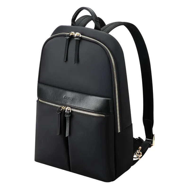 Women's nylon backpack computer bag under 20L with zip closure, laptop insert, phone pocket and certificate bag in Black or Pink