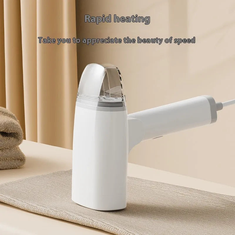 Blue and white handheld garment steamer with compact design and water tank