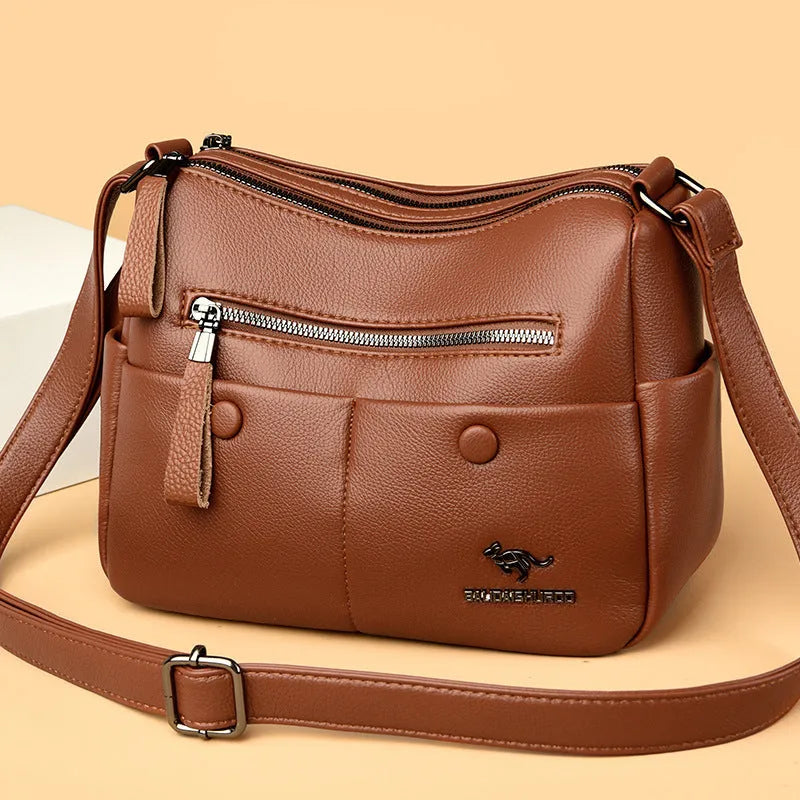 Soft PU leather women's crossbody shoulder bag in horizontal square shape with multiple internal pockets