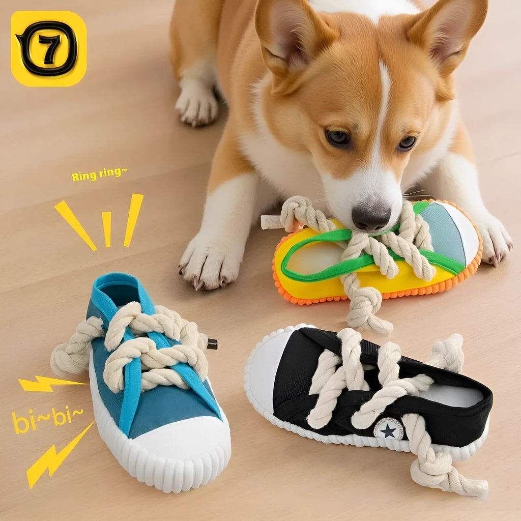 Yellow plastic dog toy shaped like a slipper with a squeaker for chewing.