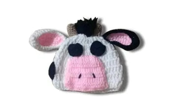 Hand-knitted white baby cow suit with matching pants and hat for newborns