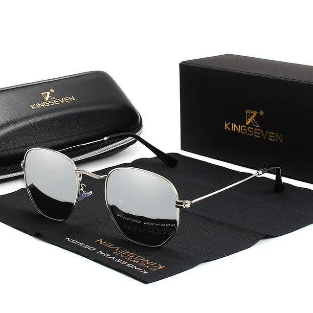 Men's classic round retro sunglasses in black frame on a grey background.