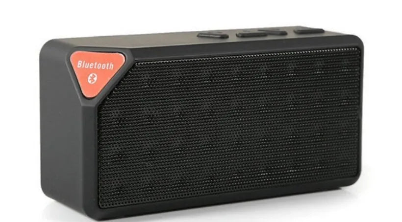Cannon X3 cube-shaped portable Bluetooth speaker in black, blue, green, red, and yellow colour options.