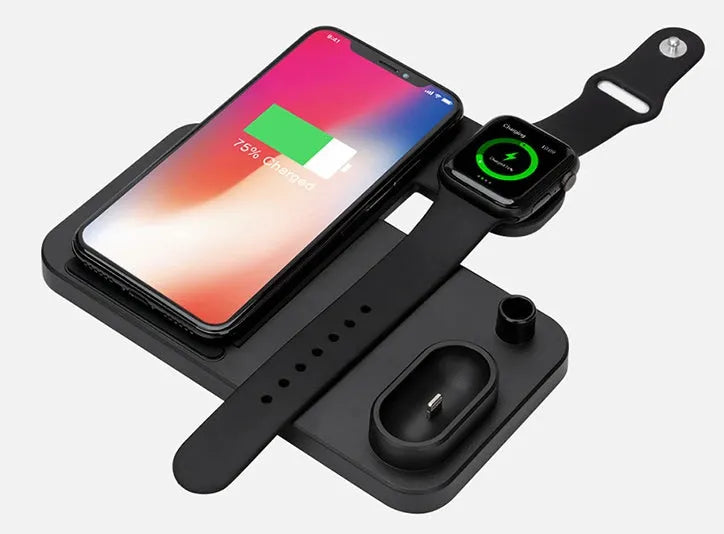 A white 4-in-1 wireless charger folded flat, showing charging pads for phone, Apple Watch, AirPods, and Apple Pencil.