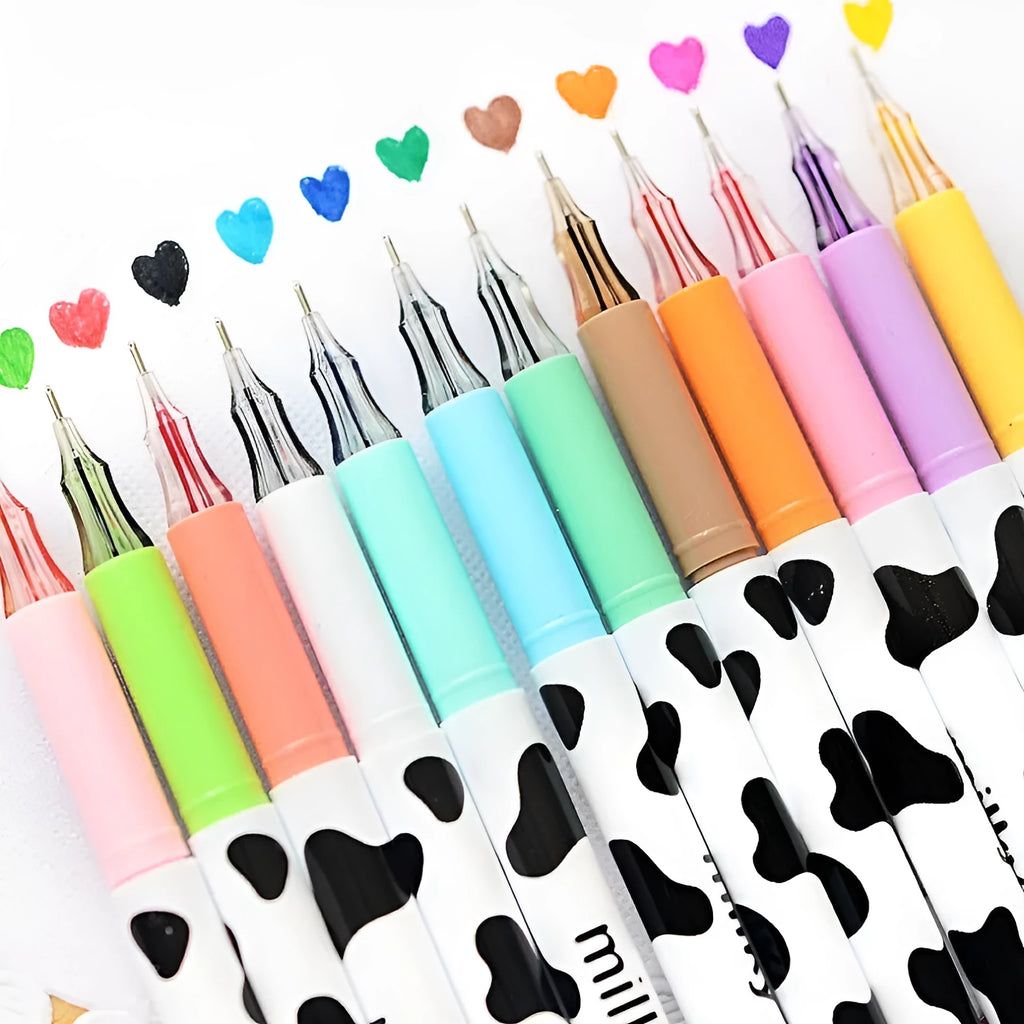 Set of 12 cow print design gel pens with 0.38mm tips in assorted colours laid out next to their box.