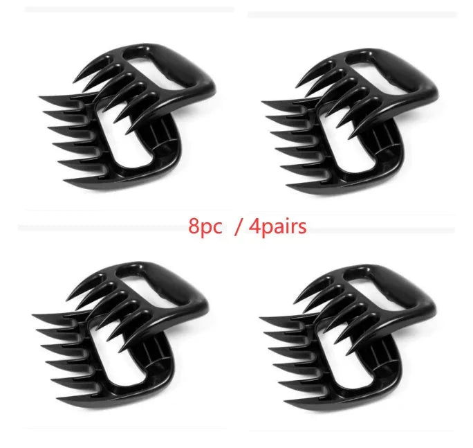 Two black bear claw design meat shredder forks for pulling pork and chicken barbecue.