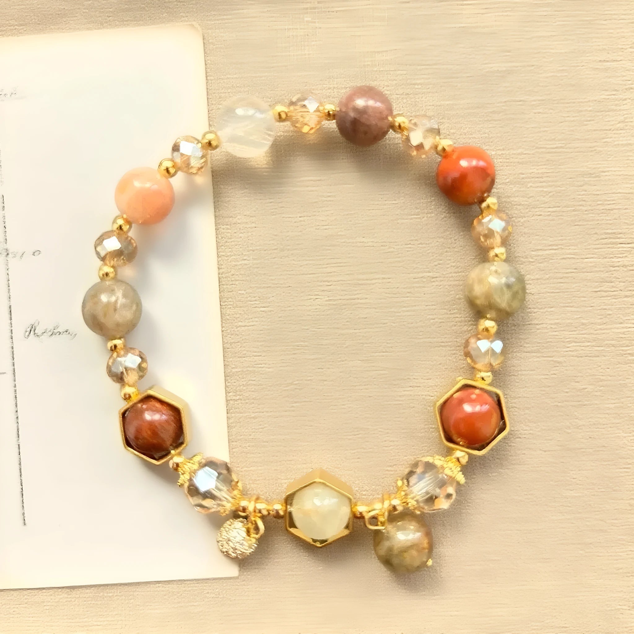 Gold citrine crystal bracelet with hand-woven auspicious symbols including Ruyi, Totem and Fu character patterns