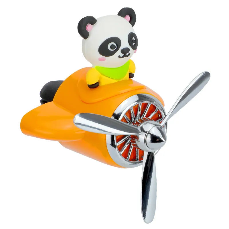 Cartoon small aeroplane shaped plastic car vent aromatherapy clip in black, blue, orange, or pink.