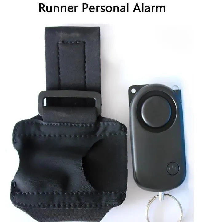 Runner Personal Alarm with LED flashing light and adjustable black wristband on white background
